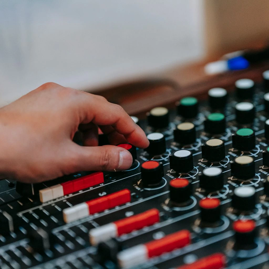 Gemix Audio mastering session UI with reference match overlay and stem meters